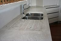 undermounted double sink with shaped drainboard